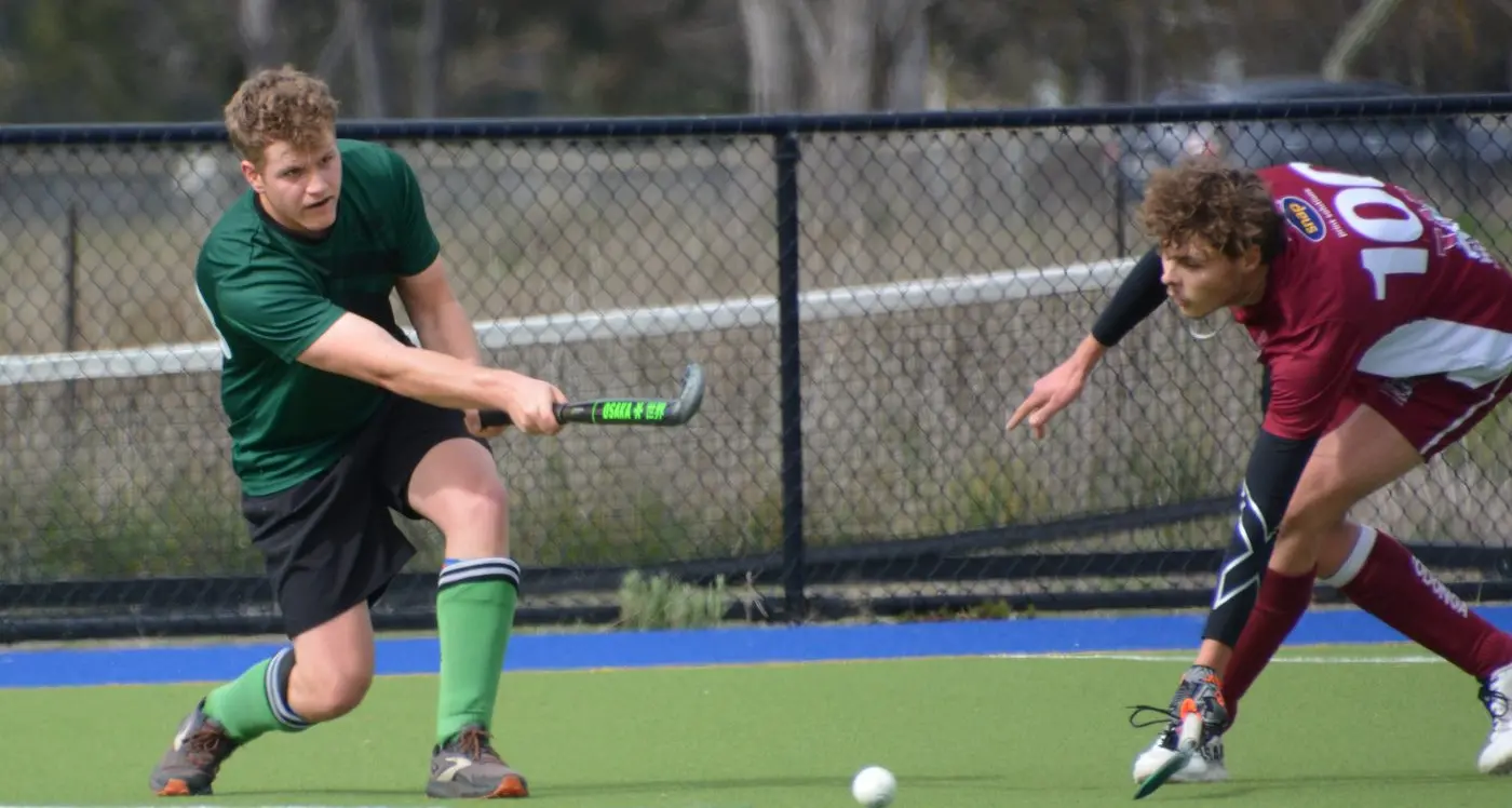 Young Dragons dominate in hockey clash