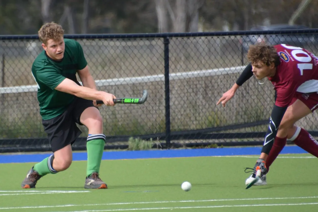 Young Dragons dominate in hockey clash