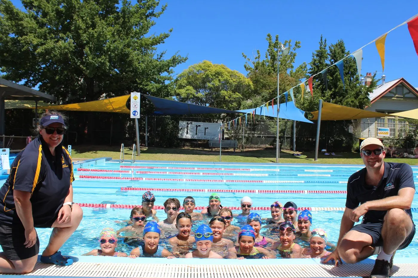 SUNNY DAY: Mansfield Swimming Club coach Alli Walker with Effortless Swimming\\'s Sam Ashby spent Saturday coaching our local swimmers on technique and stroke correction.