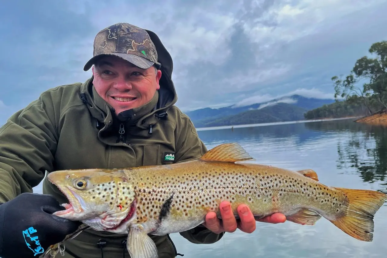 CATCH OF THE DAY: Rob Deeble with a trout caught last weekend at Lake Eildon. PHOTO: Supplied