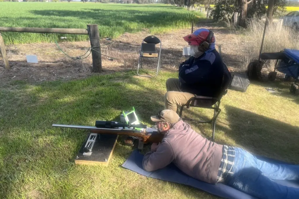 INTENSE CONCETRATION: Paul Watkins shooting under the guidance of Terry Gee.