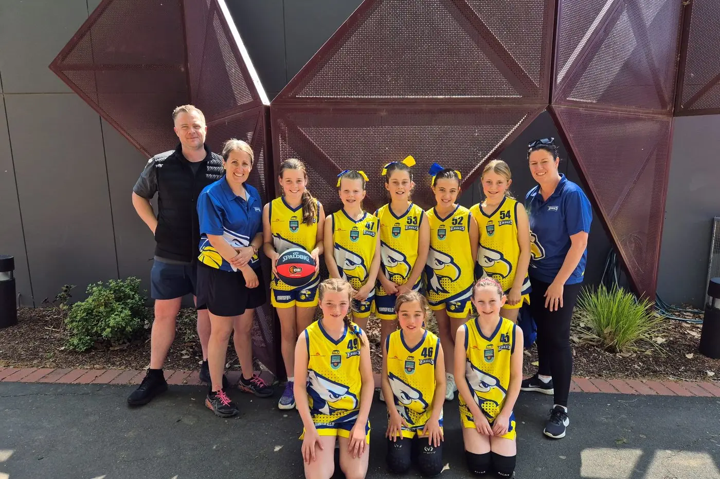 U12 GOLD: (back, from left)  Assistant Coach Ben Nally, Coach Nadia Gardner, Kate Mercieca, Macey Stevenson, Grace Mitchell, Sammi Nally, Heidi Speirs, Team Manager Bec Mills. Front Row Tayla Mills, Scout Gardner and Quinn Walsh.