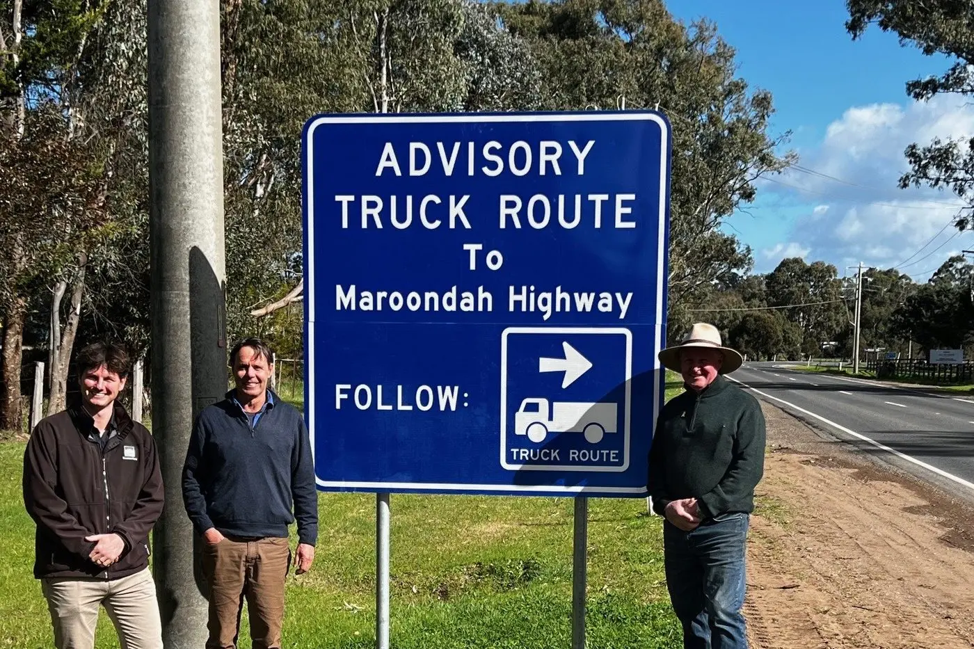 GAZETTED: Celebrating the completion of the heavy vehicle bypass upgrade is Mansfield Shire\\'s Ari Croxford Demasi executive manager capital works with Cr James Tehan and Mayor Cr Steve Rabie. PHOTO: Supplied