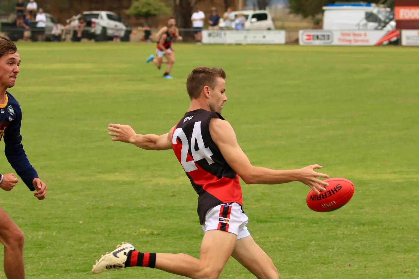TOUGH START: Despite a losing start to the season the new-look Bonnie Doon Seniors showed plenty of fighting spirit against Whorouly, Peter Cairns (pictured) battled hard around the contest. PHOTO: Paul Martin