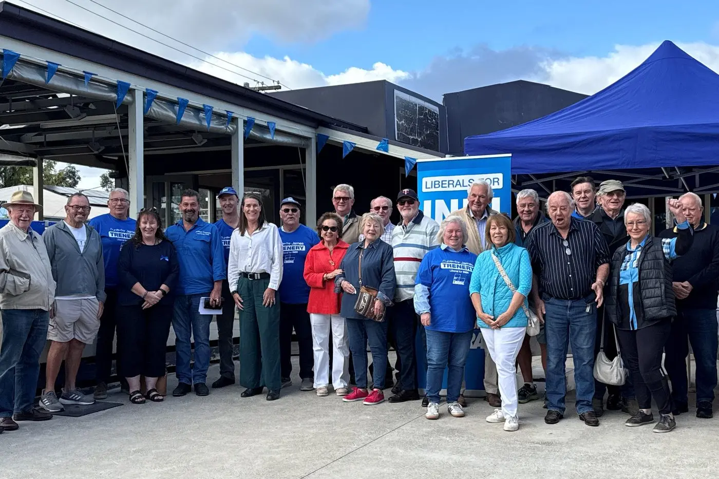 ON THE TRAIL: Senator Perin Davey and Liberal candidate James Trenery with members and supporters at the opening of the party\\u2019s pop up campaign office in Mansfield. PHOTO: Supplied.
