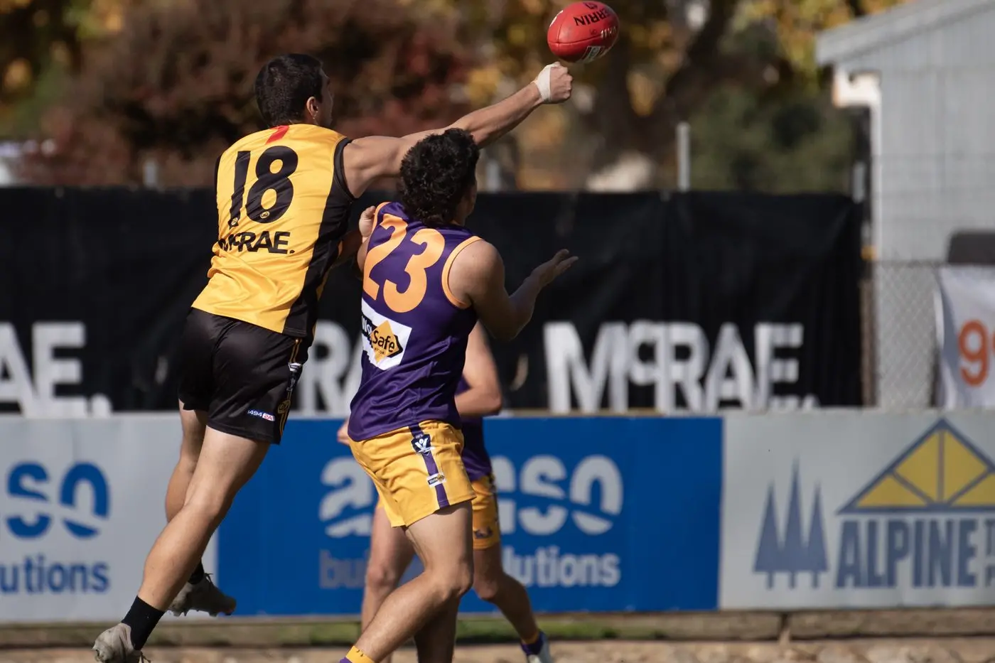 BEATEN TO THE PUNCH: Mansfield and GVL U18 Adam Storer (right) beaten to the ball in a contest with Myrtleford and O&M\\'s Harry Stripeikis. PHOTO: Melissa Beattie