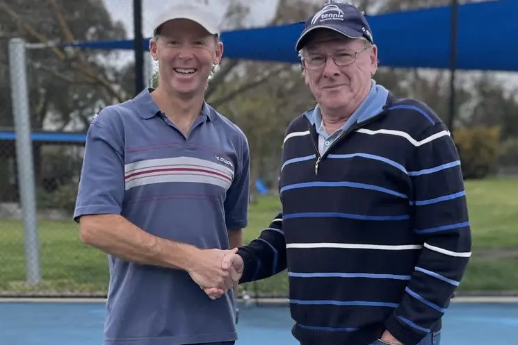 WELCOME: New coach Liam Delany with President Robert Williams PHOTO: Rhonda Carpenter