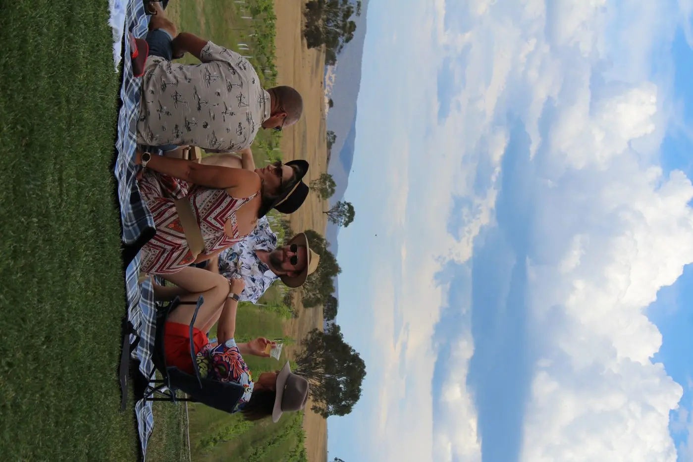 ENJOYING THE VIEW: Picnic blankets were the order of the day, with guests soaking up the sun and the good vibes.