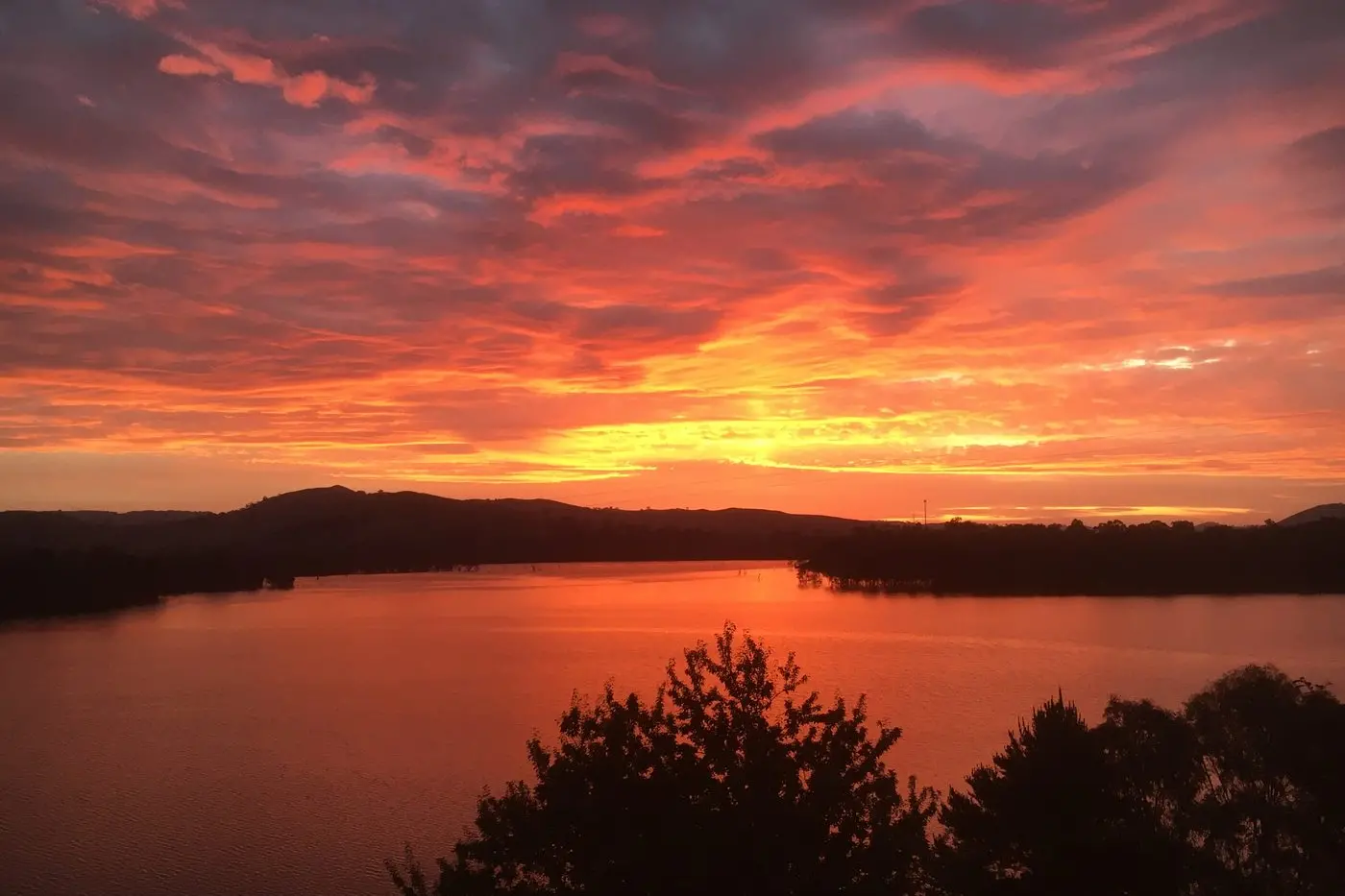 SPECTACULAR SUNSET: In late November Howard Evans snapped this beautiful sunset looking over Lake Eildon from Dry Creek Road. SUBMITTED BY: Howard Evans
