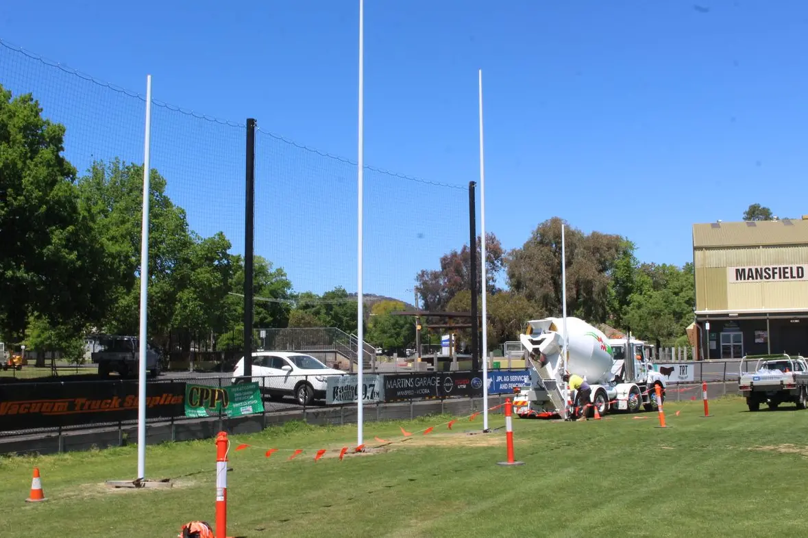 NEW POSTS: The Mansfield Recreation Reserve welcomed a new set of gleaming goal posts this week. PHOTOS: Shaun McMahon