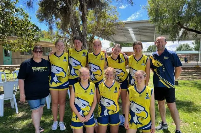 WINNERS: (From left, back) team manager Lisa Judge, Tilly Thornton, Jess Dolling, Jaspa Robinson, Molly Judge, Isabelle Byrne, coach Andrew Murray, (front) Demi Murray, Stella Brackels and Bri Weight.\\n