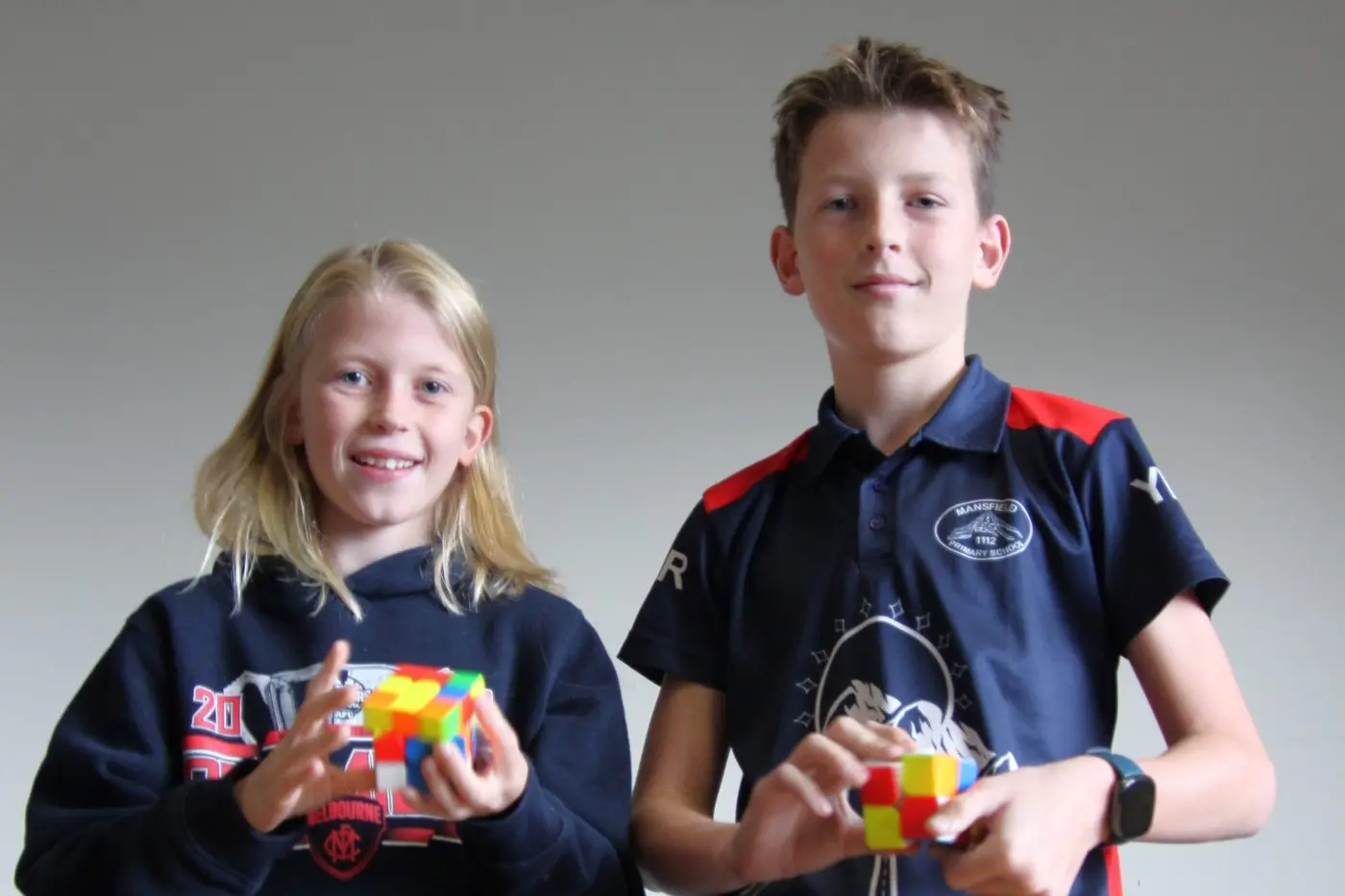State championships for speedcubing siblings