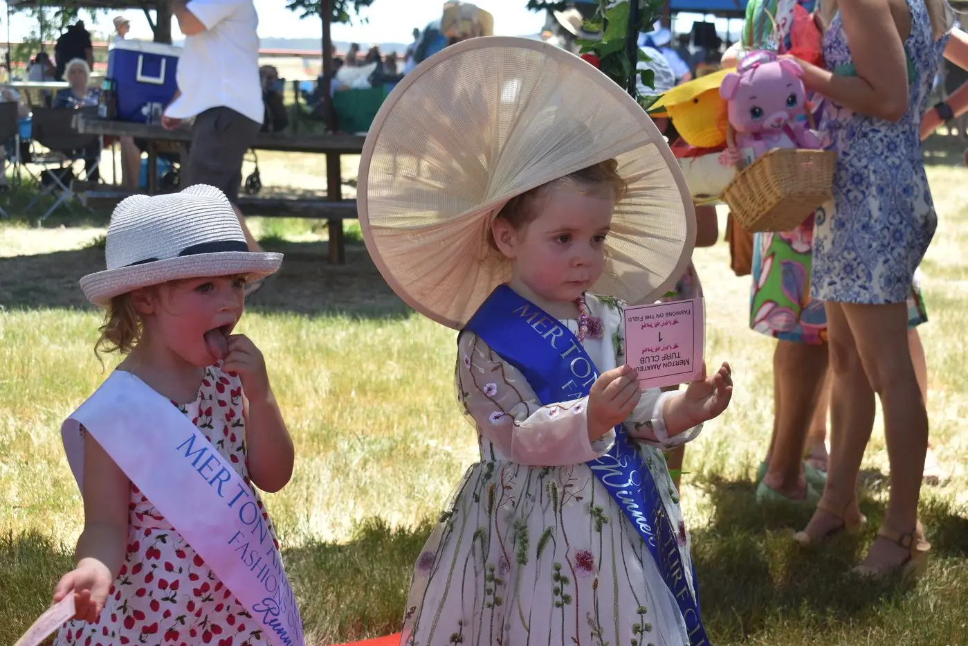 MINI FASHIONS: In the Tiny Tots Girls section of the Fashions on the Field Tammy Drysdale (right) was the outstanding winner with her very fashionable hat with Eivie (left) coming in a close runner up. PHOTOS: PAM ZIERK\\u2013MAHONEY