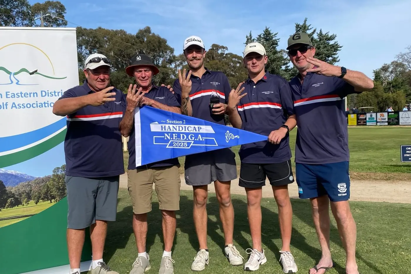 TRIPLE TREAT: Mansfield\\u2019s Division 2 handicap side celebrate a third straight pennant title.