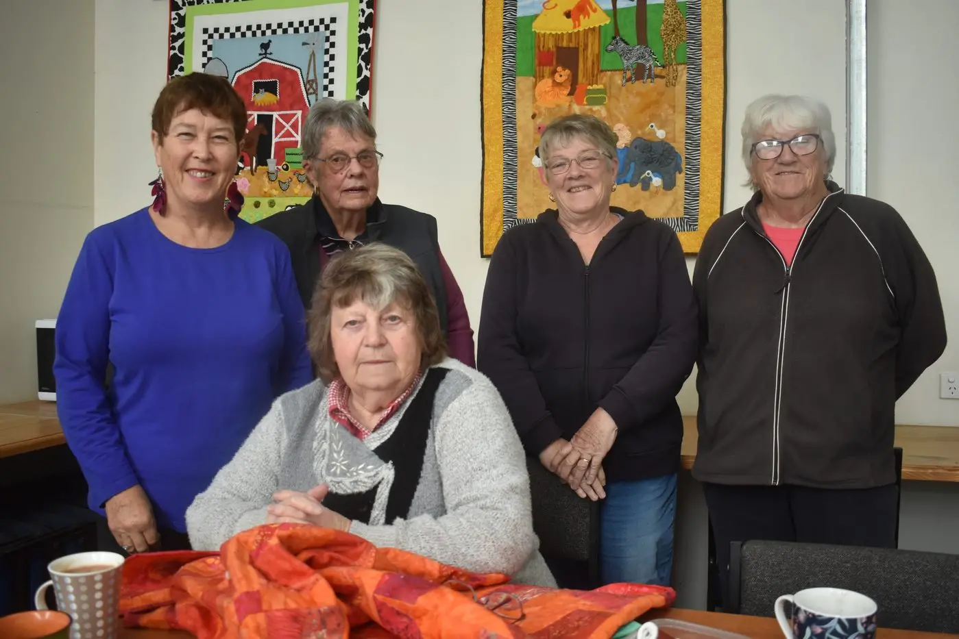 HAPPY TIMES: Enjoying the friendliness and companionship of the Mansfield Thursday Craft Group and making wishes for Mother\\'s Day were (from back, left) Michele Wykes, Rita Tomic, Gail Speechley and Mary Dale; (seated) Joan Tie. Id:40839