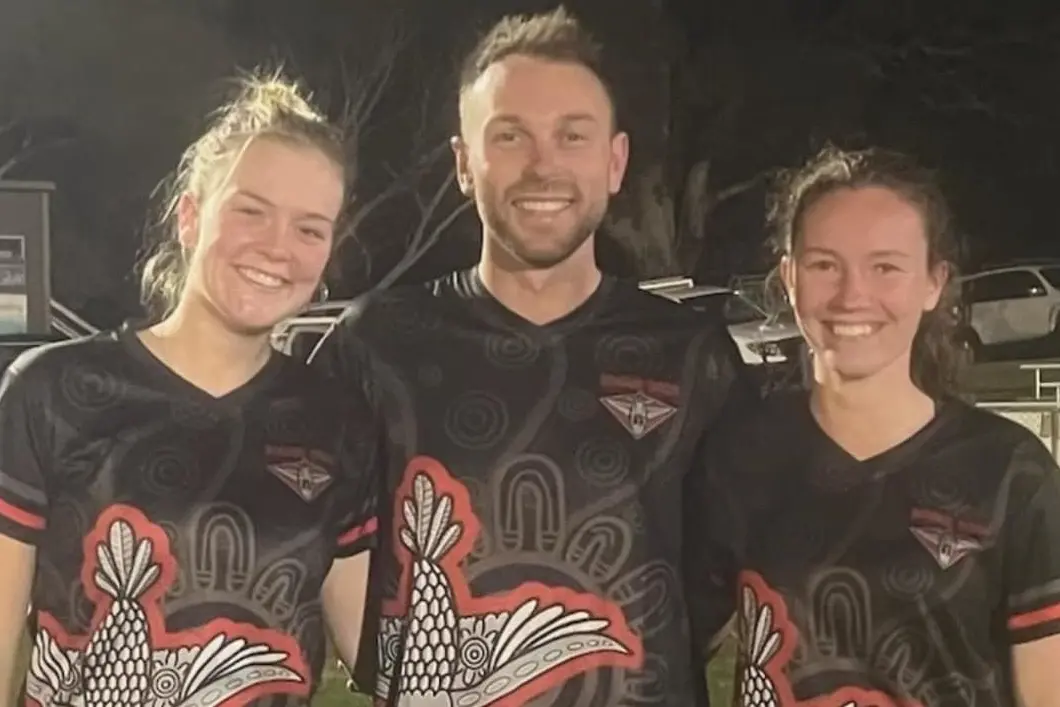 BIG THANKS: The Bonnie Doon Football & Netball Club thanked local artist Talitha Annuscheit for the fantastic NAIDOC top Design, a Taungurung women living in Mansfield who is very passionate about her art work and culture.