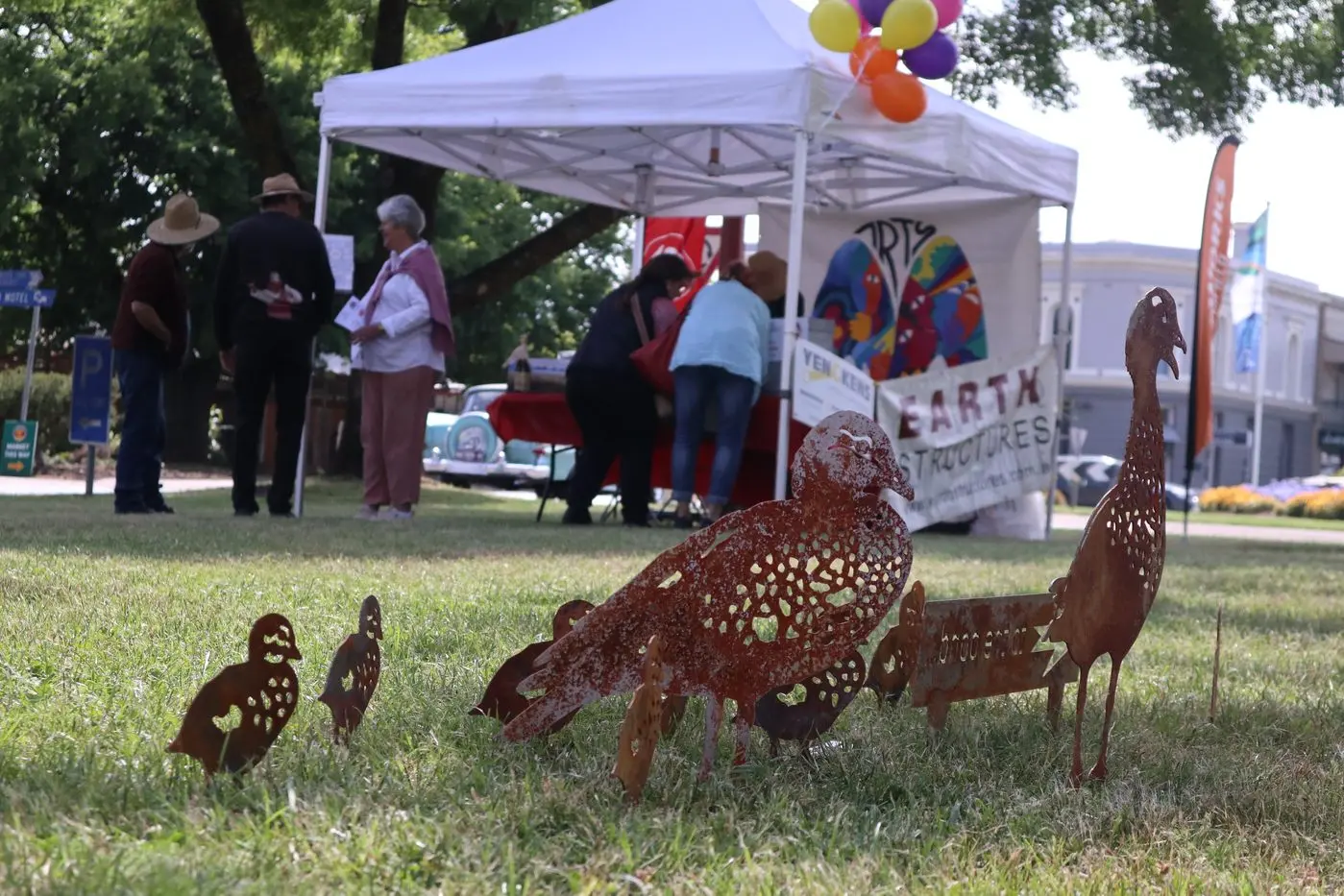 SCULPTURE IN THE GRASS: Volunteers were kept busy watched on by Sally Harvey\\'s Duck\\'s Day Out.\\n\\n