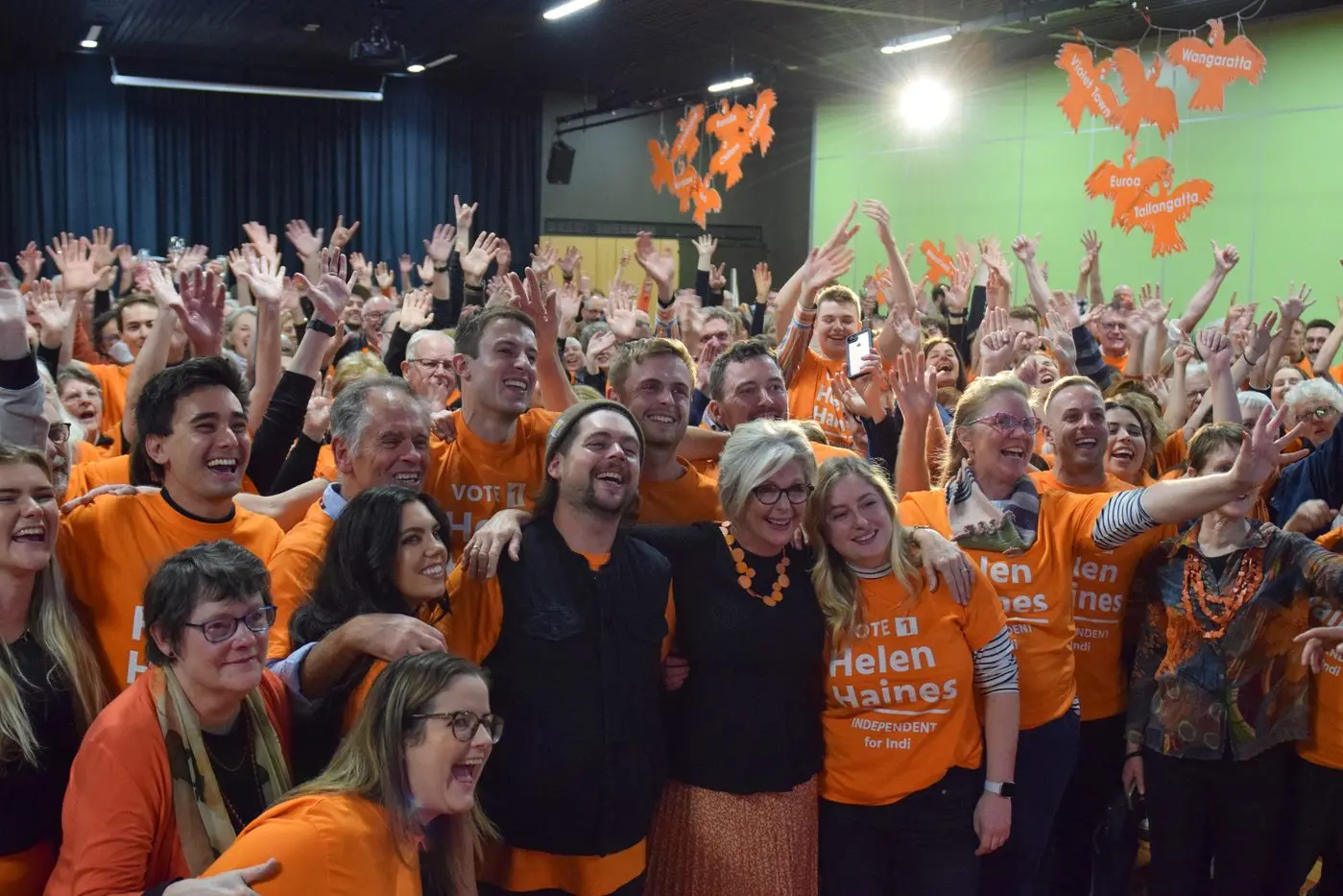 CAMPAIGN CELEBRATION: Independent member for Indi Helen Haines (centre front) celebrated her re\\u2013election to federal parliament with family and campaign volunteers at the Wangaratta Performing Arts and Convention Centre on Saturday night.  PHOTO: Brodie Everist Id:25167