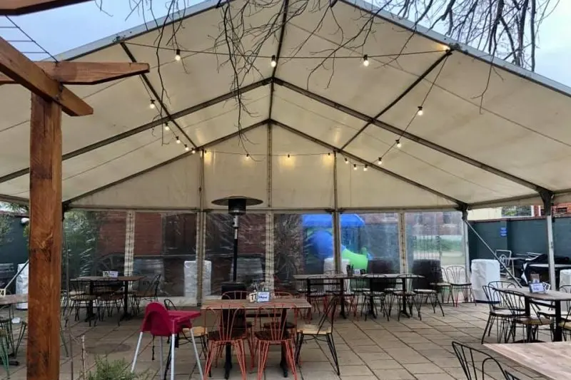 OPEN AGAIN: Mansfield businesses have welcomed the easing of restrictions and are now \\'open for business\\'. Pictured is the Mansfield Hotel\\'s covid-safe set-up. PHOTO: Mansfield Hotel