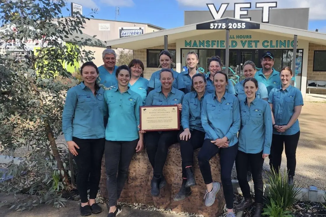 BIG SMILES: Mansfield Veterinary Clinic and their new award.