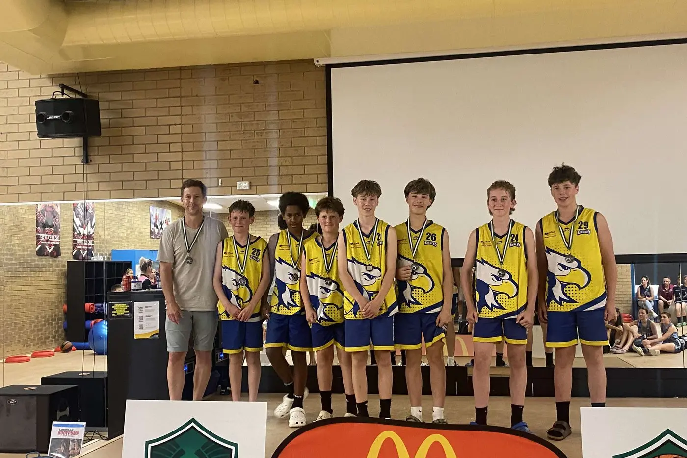 DETERMINATION AND GRIT: Coach Fraser Stevenson with the Under 16s Blue boys Jay Kynnersley, Bodhi Kileen, Coby Hodge, Levi Stevenson, Billy Turner, Gus Robinson and Toby Gerrans.