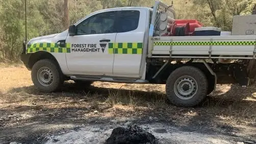 Fire on ban day lands men in court