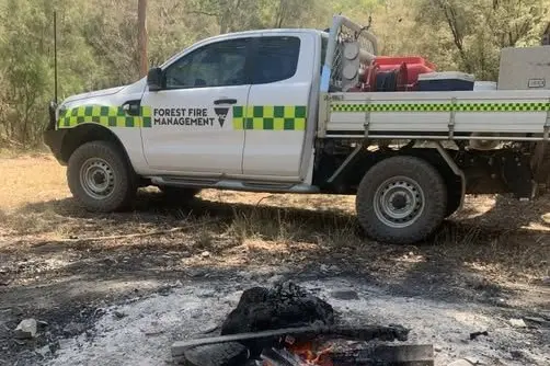 Fire on ban day lands men in court