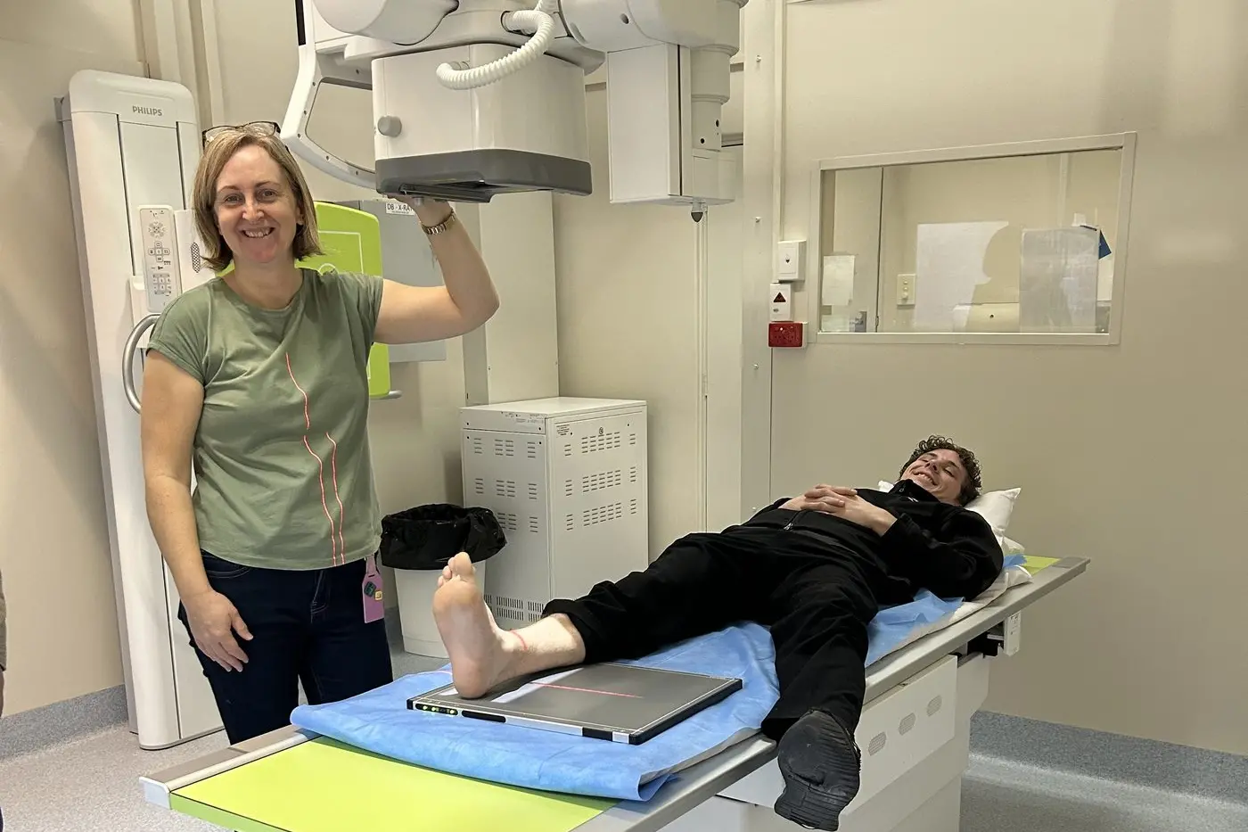 NEW EQUIPMENT: Oscar Rathbone was the first patient to use the new X-ray system aided by radiographer Fiona Creighton.