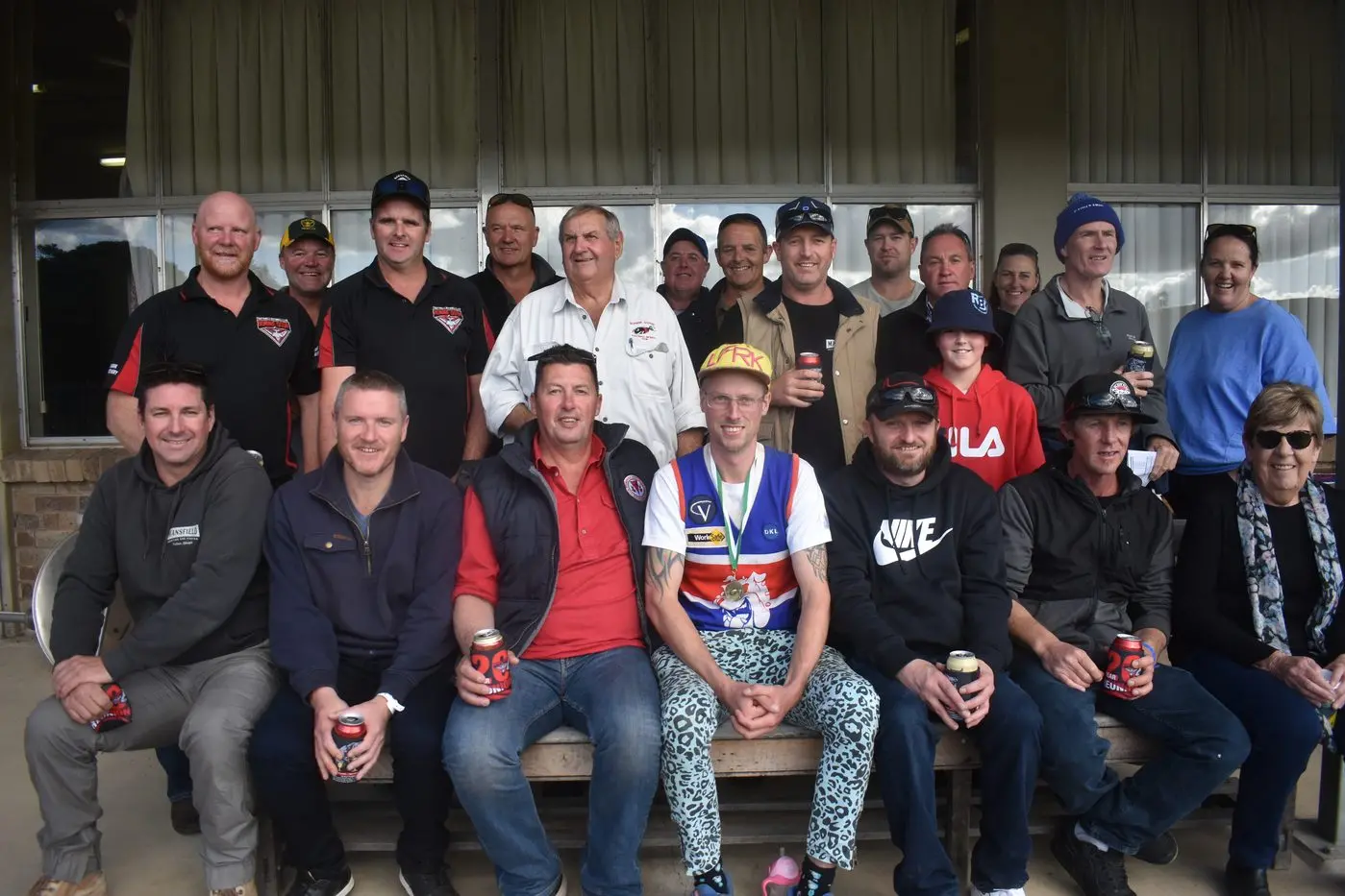 ALL TOGETHER: Gathered on the top deck of the Bonnie Doon Recreation Reserve building were returning premiership players with some of the long\\u2013term club officials who have supported the Bombers for many years. PHOTO: Pam Zierk\\u2013Mahoney Id:40631