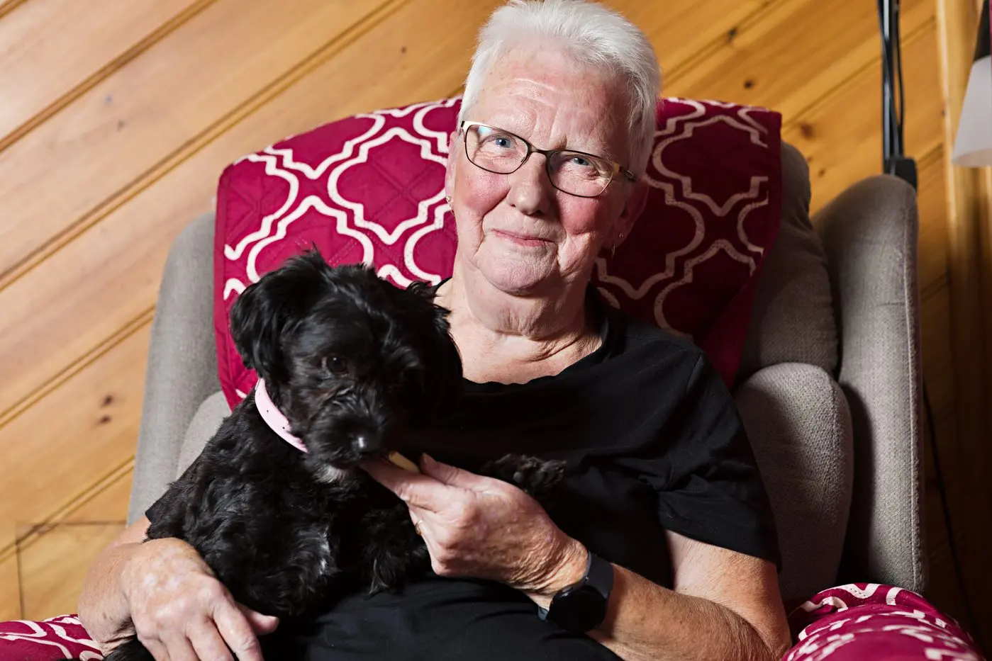 INDEPENDENT LIVING: Kathy Hazell, with her much loved poodle pup Milly, continues to live safely and independently at home thanks to the care and support she receives through Uniting AgeWell. PHOTO: Supplied
