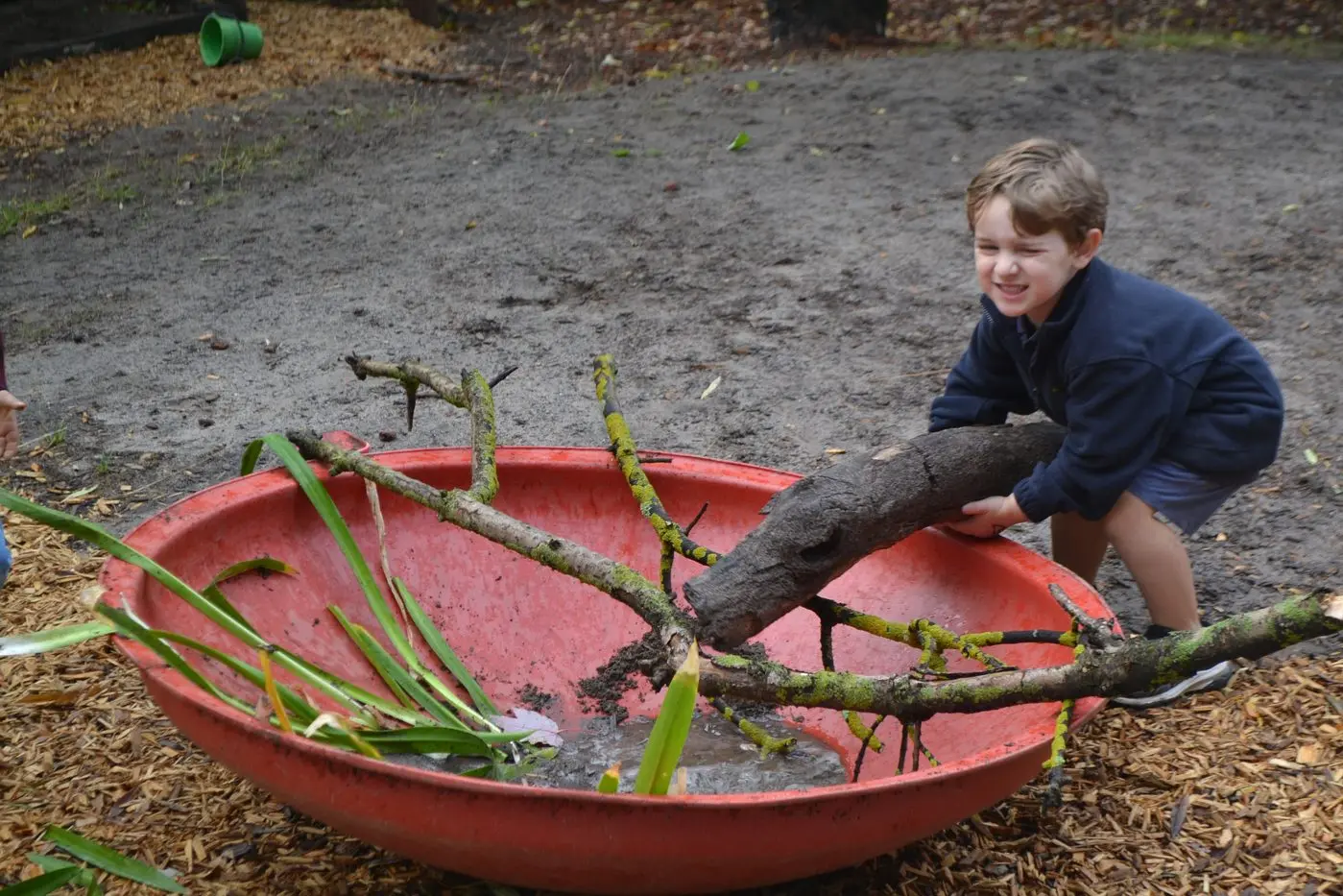BRIGHT BEGINNINGS: Children at Mansfield Kindergarten enjoy play-based learning through local excursions and hands-on activities. Pictured is Leonardo V showing his helping hands. PHOTO: Supplied