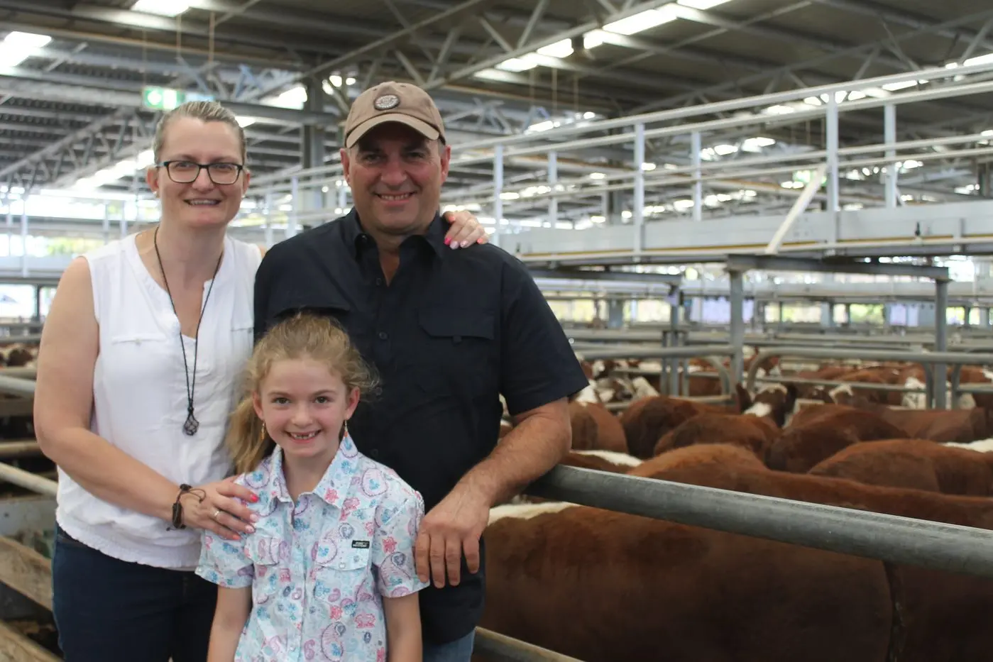 CASHING IN: Maindample\\'s Vincenza Di Filippo and Tony Marchese, with daughter Elena (7) were looking to sell a total of 52 head of cattle at Friday\\'s All Breeds Feature Weaner Sale. PHOTOS: Ryan Malcolm Id:35737