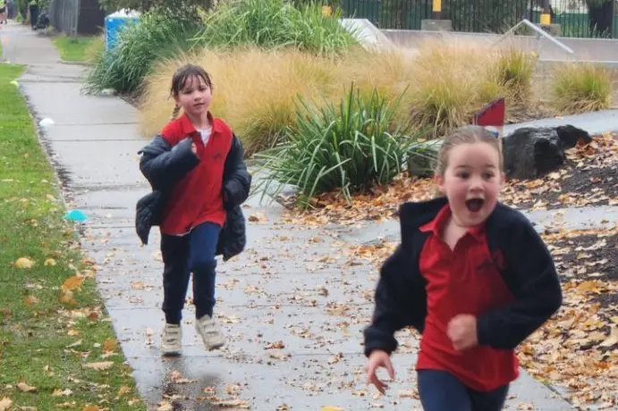 CROSS COUNTRY: Prep students Evie Carton and Skyler Howie embraced the 1.2 kilometre run. Id:42306