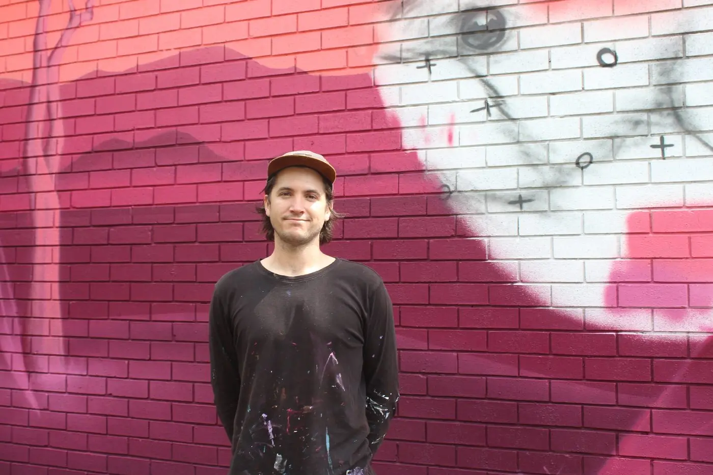 MURAL MAKER: Melbourne artist Alex Sugar was commissioned to paint a mural on the outside of the Bendigo Bank Building.