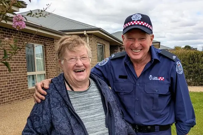 LOCALS: Adele McCormack with Merrijig CFA Volunteer John Findlay PHOTO: Marta Wakeling
