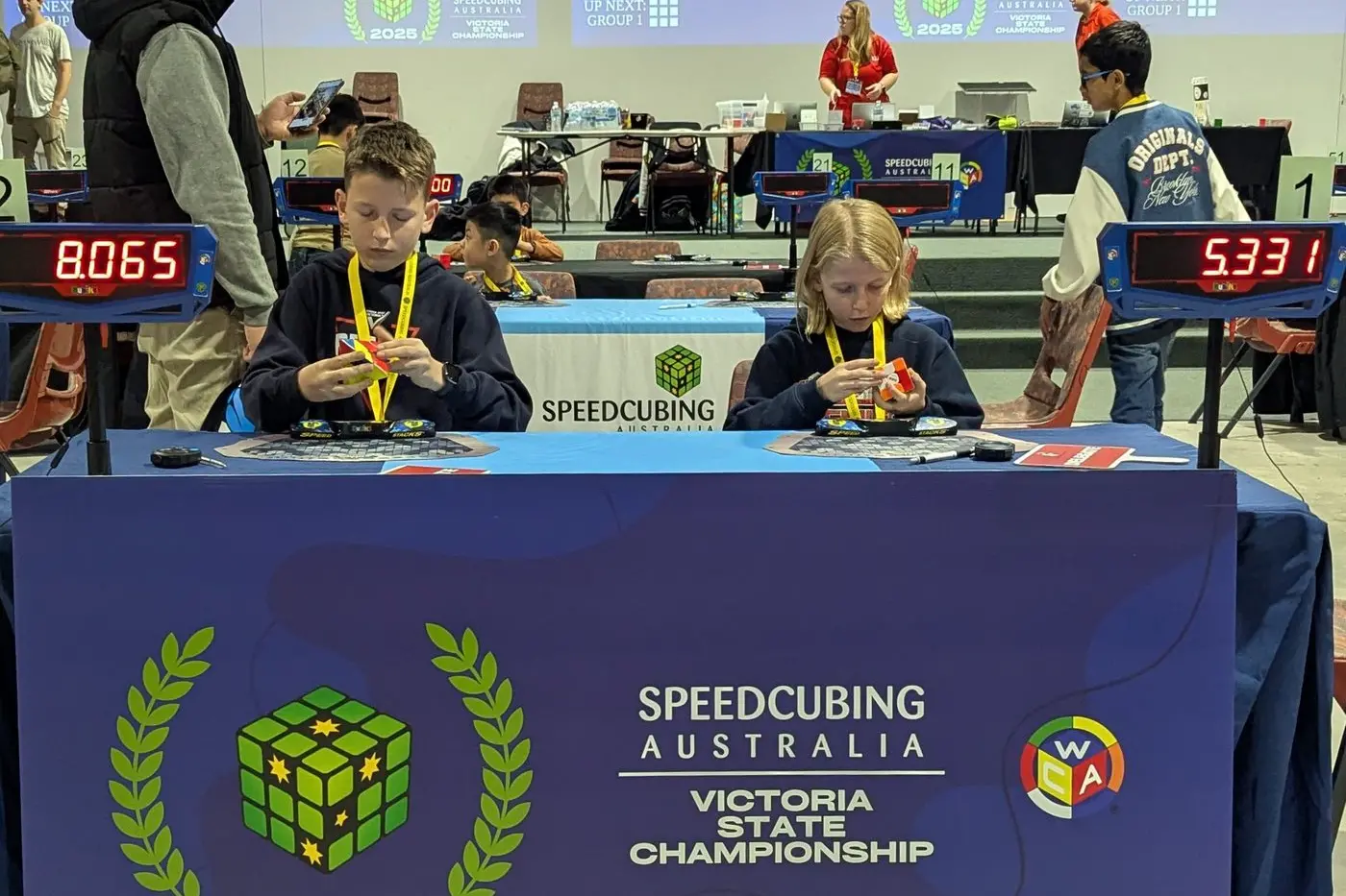 FOCUS: Siblings Harvey and Vivian Knight in action at the state speedcubing championships last month. PHOTOS: Supplied