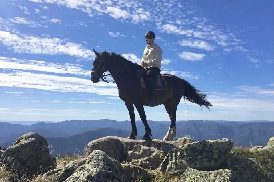 ON TOP OF THE WORLD: Ross Vinton tackles Mt Stirling on horseback, adding to his fundraising kilometres for Mansfield Autism\\'s rideathon. Id:33310