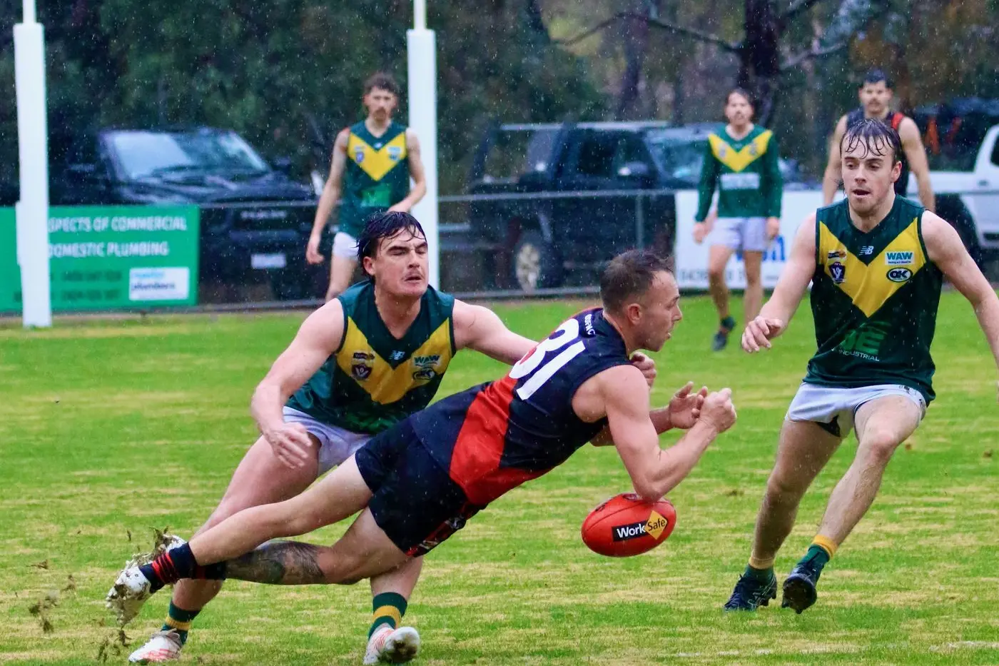 SLIPPERY WIN: On Saturday in wet conditions the Bonnie Doon defeated Moyhu by 31 points with Bomber Jack Goonan showing true determination.  \\nPHOTOS: Paul Martin\\n