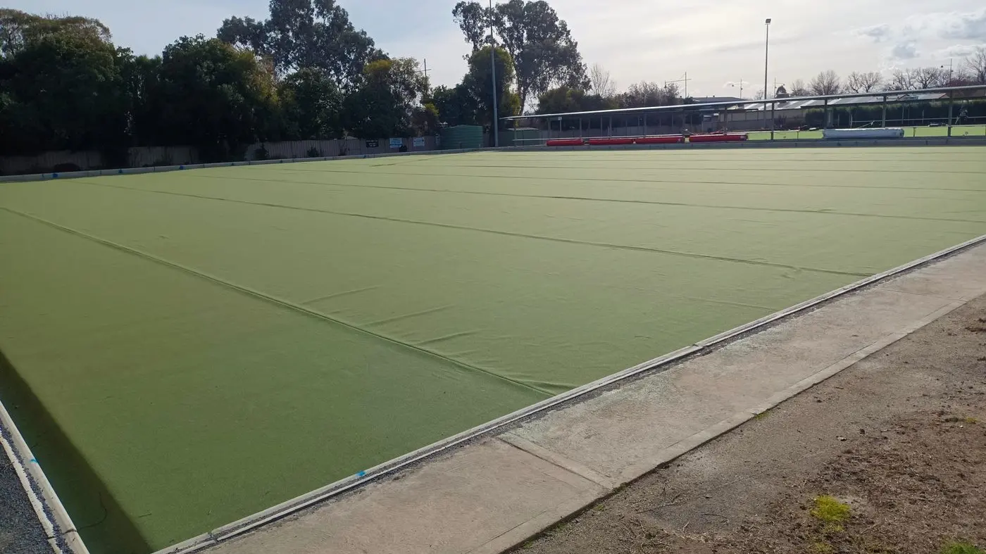 Social bowlers battle weather as new green nears completion