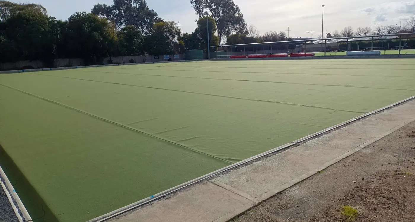 Social bowlers battle weather as new green nears completion