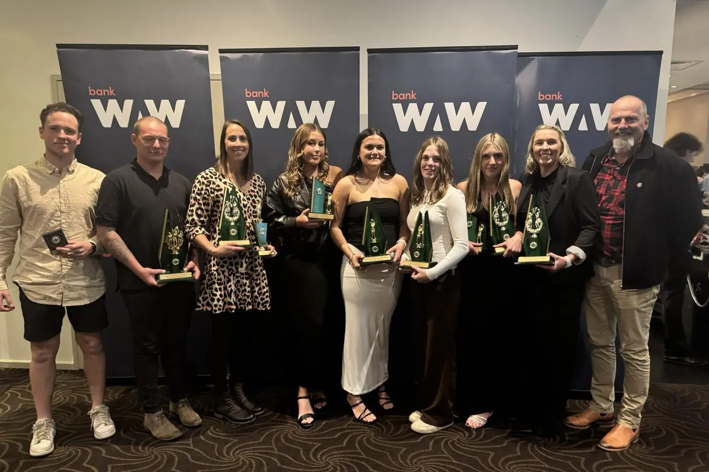 BEST AND FAIREST: (From Left) Joel Sanford, Sean Campitelli, Steph Evans, Keira Thornton, Amy Cash, Carly Desmond, Lara Klingsporn, Jess Harris, Dave McMahon (Club President) at the Ovens and King League\\'s awards night.
