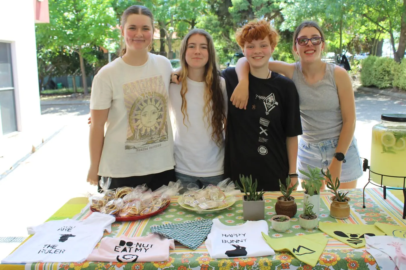 CHRISTMAS STALL: Mansfield Autism Statewide Services Hands On Learning students sold handmade products out the front of the MASS office last Thursday. (from left) Hayley Seymour, Ainsley Smyth, Keely Bradshaw and Addison Wadsworth. PHOTO: Trinity Knight