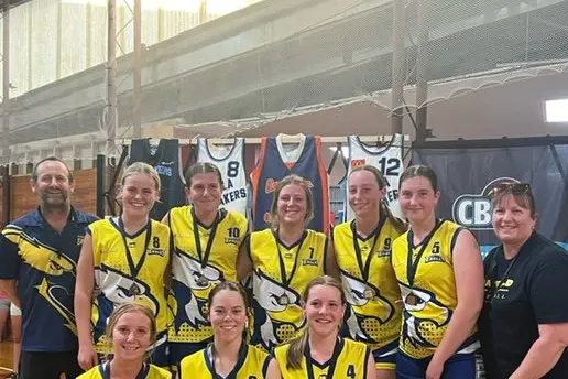 CHAMPION BASKETBALLERS: A winning side performs at Benalla; Andrew Murray coach (left back), Tilly Thornton, Jess Dolling, Isabelle Byrne, Jaspa Robinson, Molly Judge, team manager Lisa Judge, Stella Brackels (left front row), Bri Weigh and Demi Murray. PHOTO: Supplied\\n
