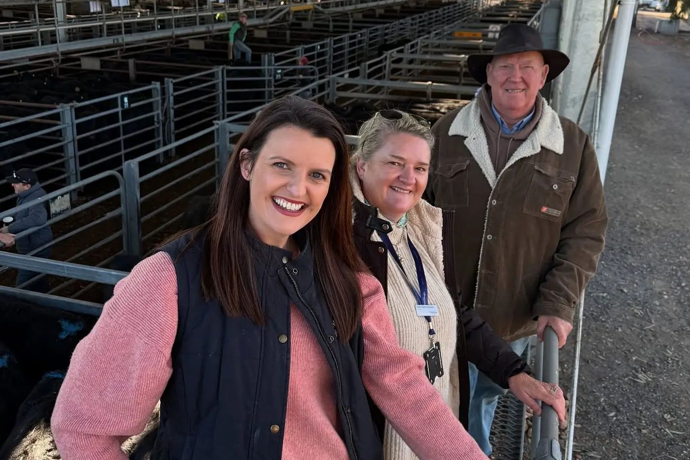 LISTENING TO THE COMMUNITY: Member for Euroa Annabelle Cleeland at the Euroa cattle sale with Strathbogie Shire Council mayor, Claire Ewart-Kennedy, and mental health advocate, Ivan Lister.