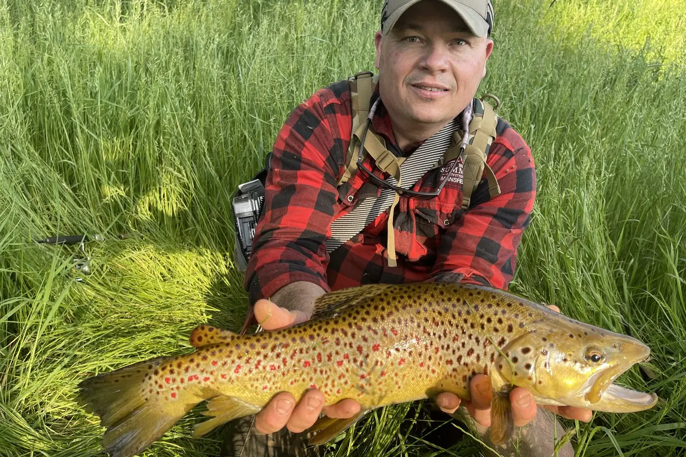 REEL IT IN: Rob Deeble enjoys trout fishing in the various streams and rivers across the shire. He is pictured with a nice brown trout caught in one of the local rivers.