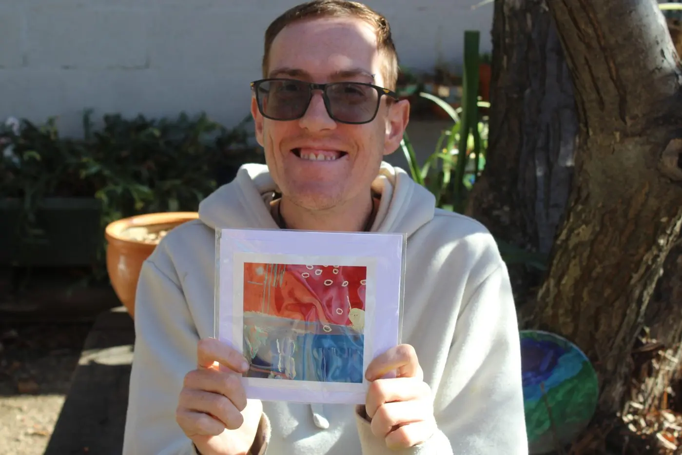 BEAMING ARTIST: Ben was a reluctant painter but now can\\'t get enough of it. PHOTOS: Hannah Kennelly 