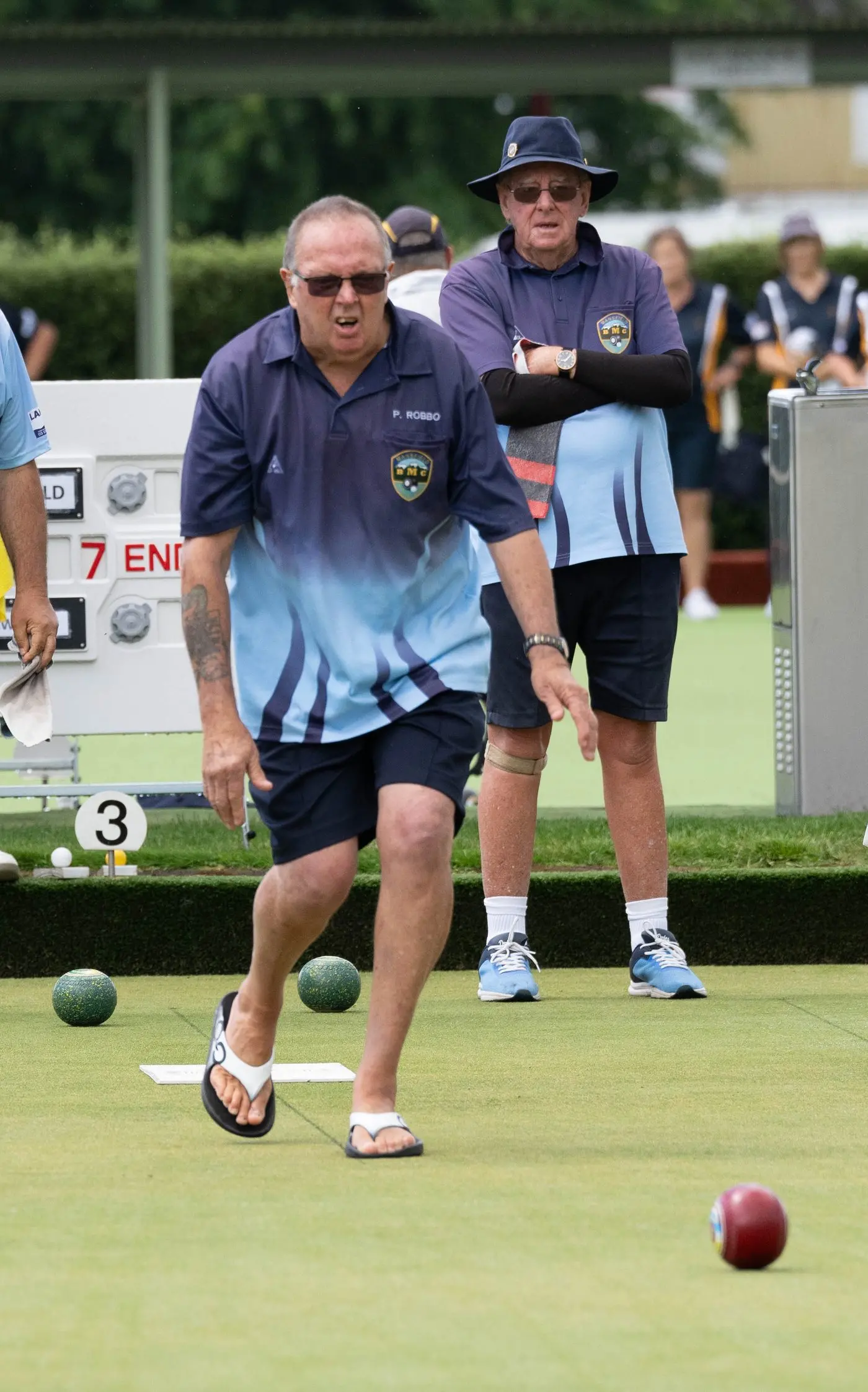 ON A ROLL: Peter Roberts urges his bowl towards the kitty while Noel Jackson watches on. PHOTO: Ken Rainsbury