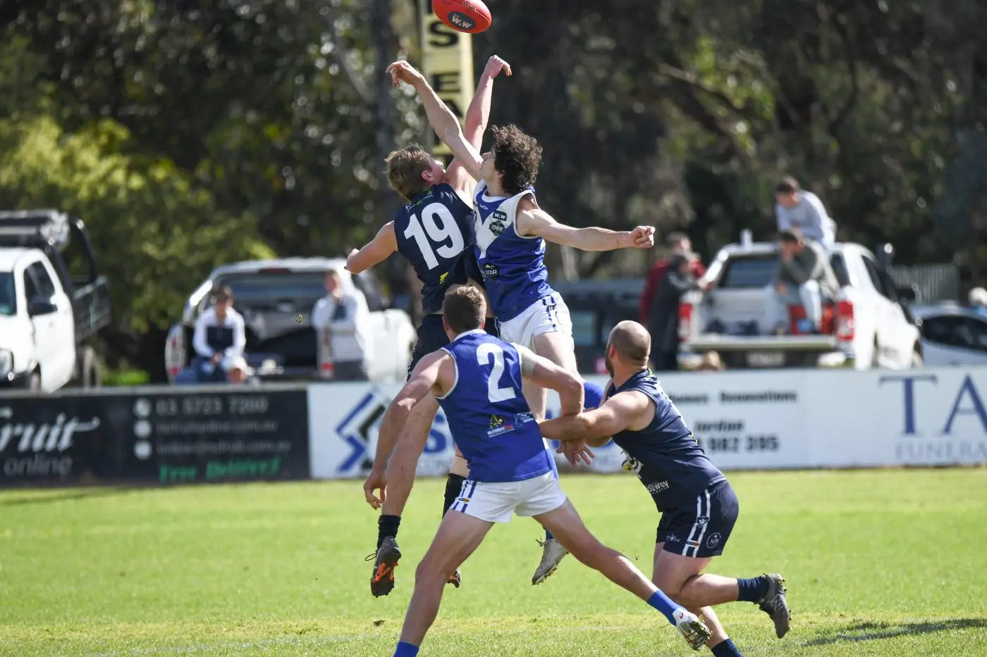 CONTEST: Ruckmen Mark Wettern (left) and Joe Gray go head to head in the centre of the ground. PHOTOS: Kurt Hickling