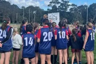 TEAM EFFORT: Mansfield Primary School girls at the state football finals sporting their new jerseys. PHOTO: Supplied