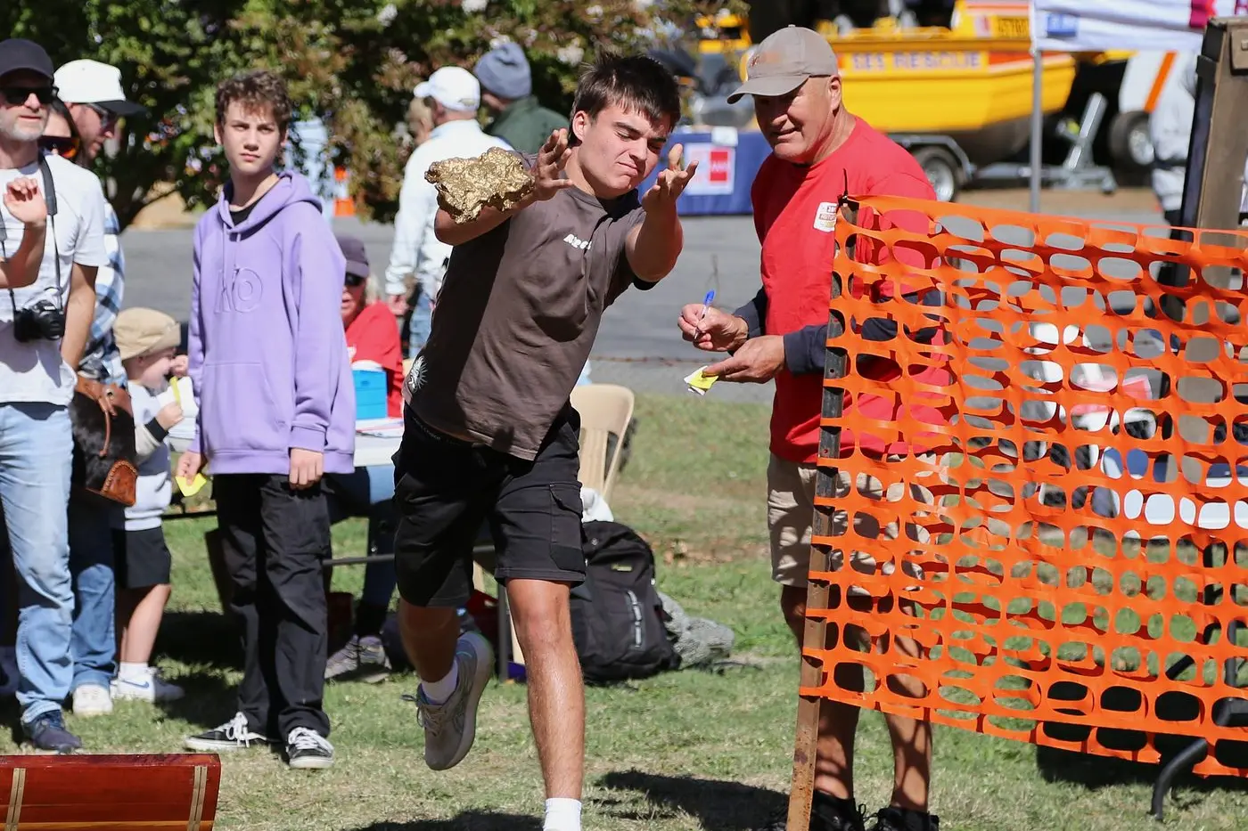 GIVE IT A GO: Competitors gave it their all, with the gold nugget throw a festival favourite. PHOTO: Freddie Leong 